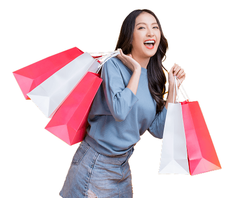 Phụ nữ trẻ với túi mua sắm - Vay tiêu dùng QTDND Duy Thanh